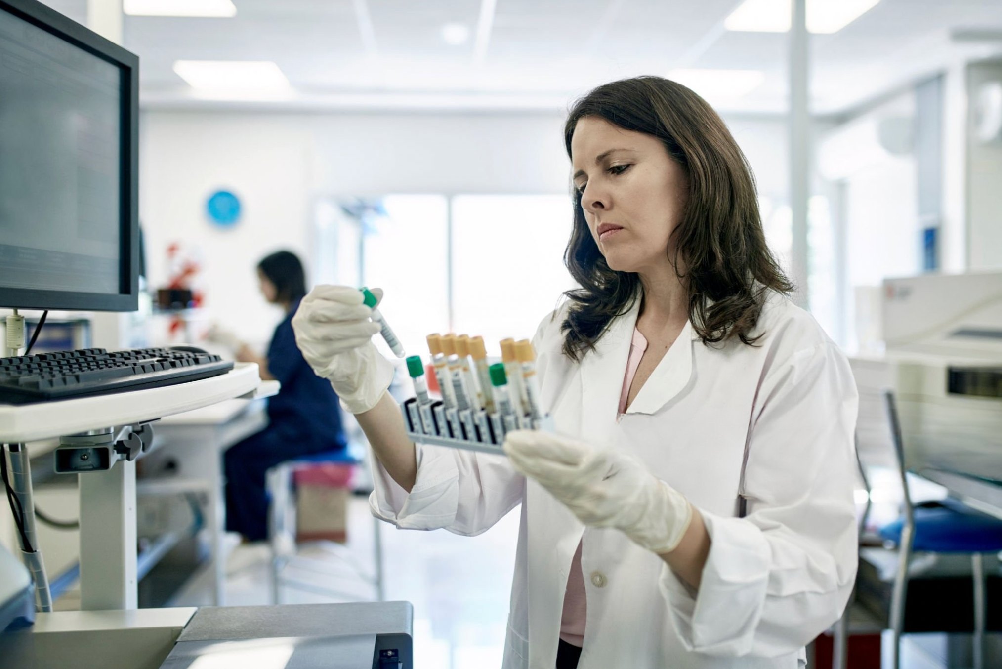Lab scientist processing samples